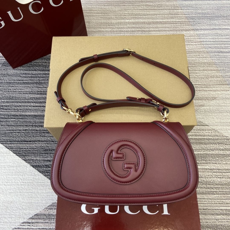 G*u*i top handle bags